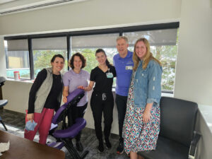 Carolinas mobile massage team pictured at corporate chair massage event